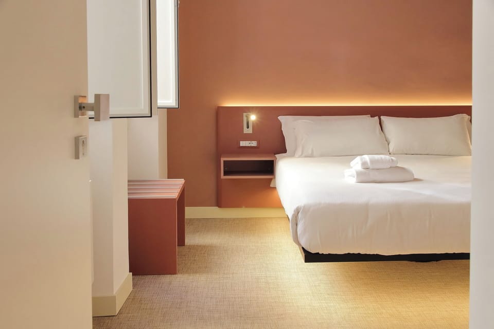 Deluxe Double Room | In-room safe, desk, laptop workspace, blackout drapes