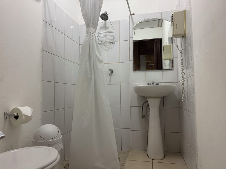 Family Quadruple Room | Bathroom | Shower, hair dryer, towels, soap