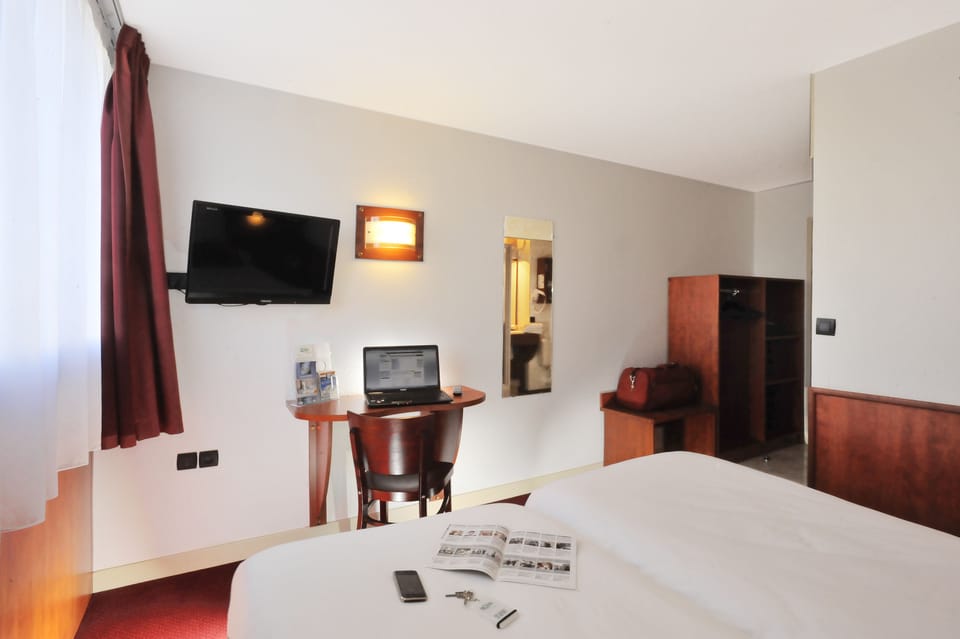 Twin Room | Premium bedding, desk, blackout drapes, soundproofing