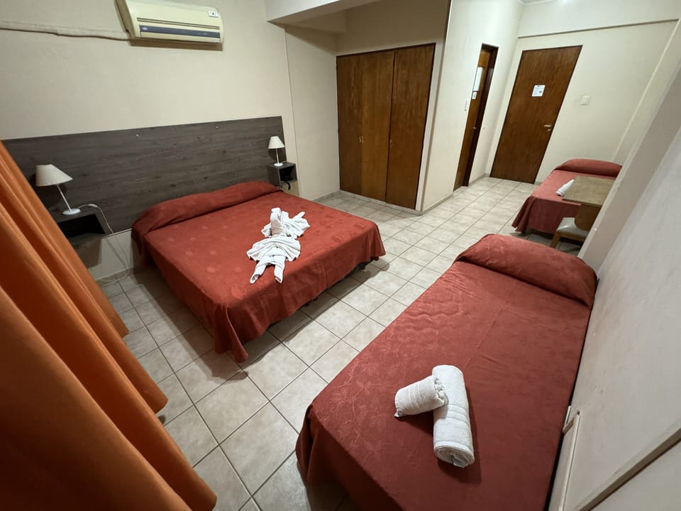 Standard Quadruple Room, City View | In-room safe, bed sheets, wheelchair access