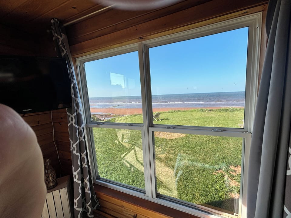Standard Duplex, 3 Bedrooms, Ocean View, Beachfront | Living area | Flat-screen TV, fireplace
