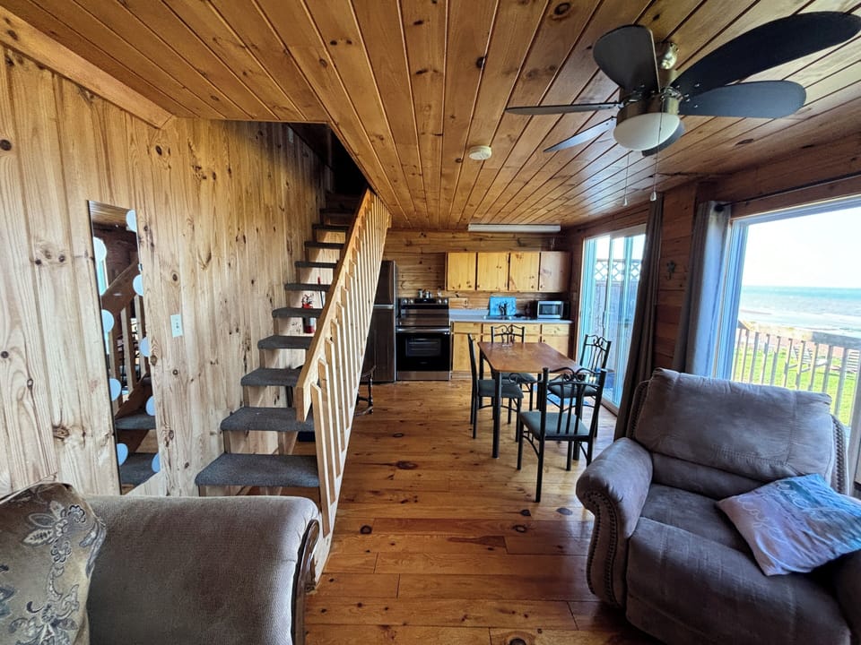 Standard Duplex, 2 Bedrooms, Ocean View, Beachfront | Living area | Flat-screen TV, fireplace