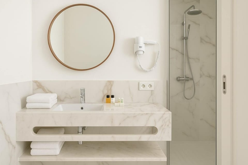 Comfort Double or Twin Room, Partial Sea View | Bathroom | Shower, hair dryer, towels, soap