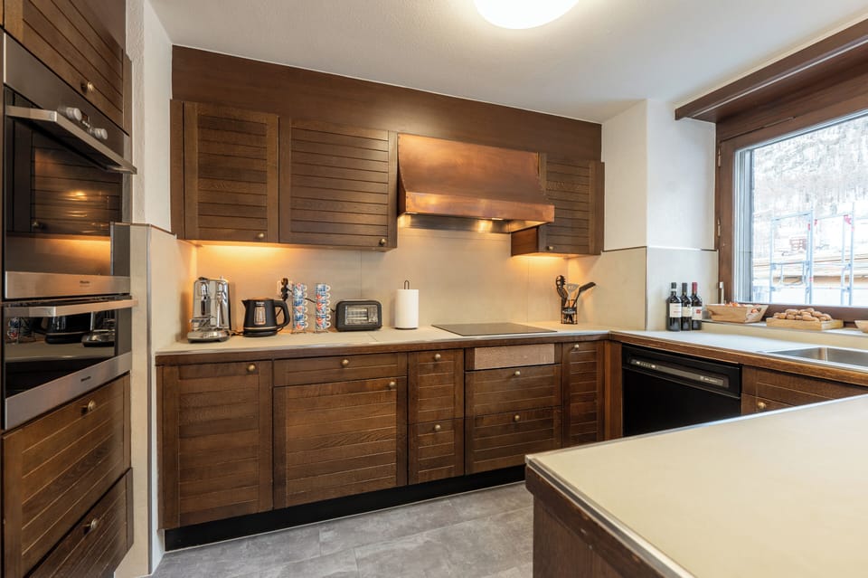 Deluxe Condo, Non Smoking, City View | Private kitchen | Fridge, stovetop, dishwasher, electric kettle