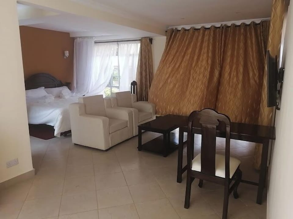 Deluxe Double Room, Garden View | Free WiFi, bed sheets