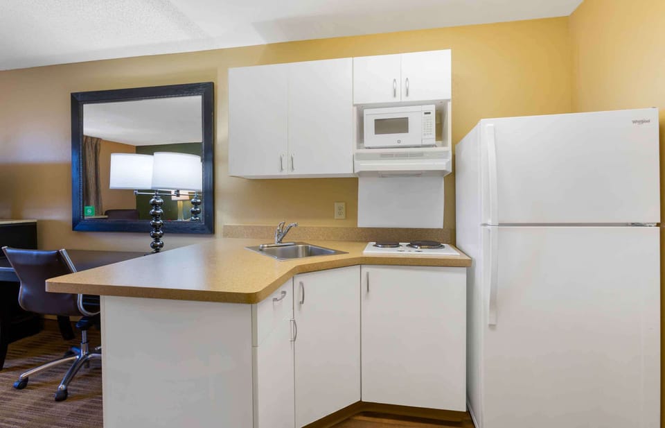 Studio, 1 Queen Bed, Non Smoking | Private kitchen | Fridge, microwave, stovetop, coffee/tea maker