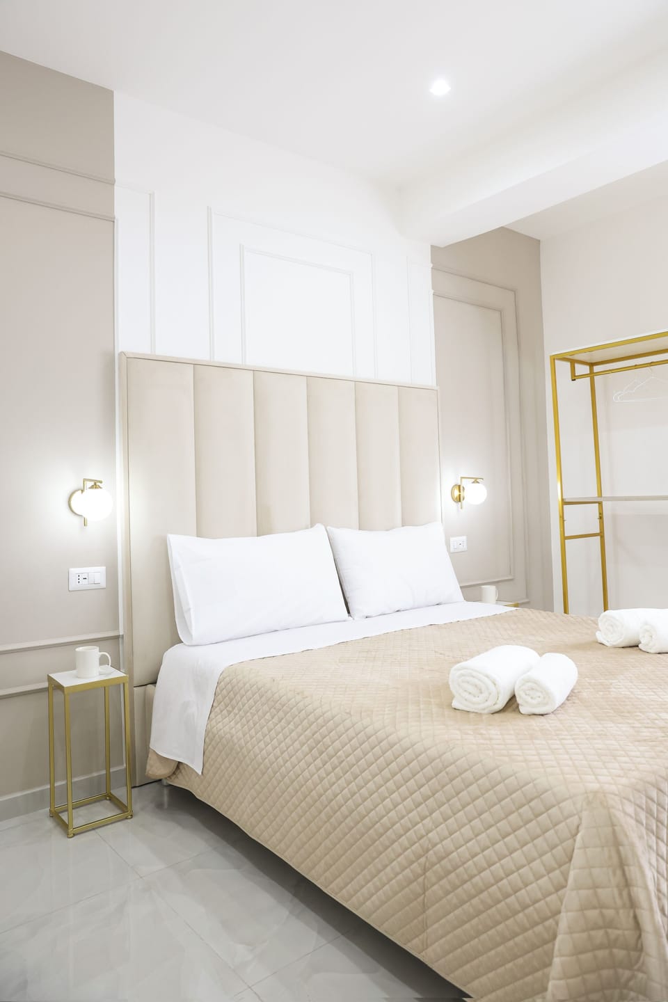 Room with beige bed | Blackout drapes, soundproofing, free WiFi
