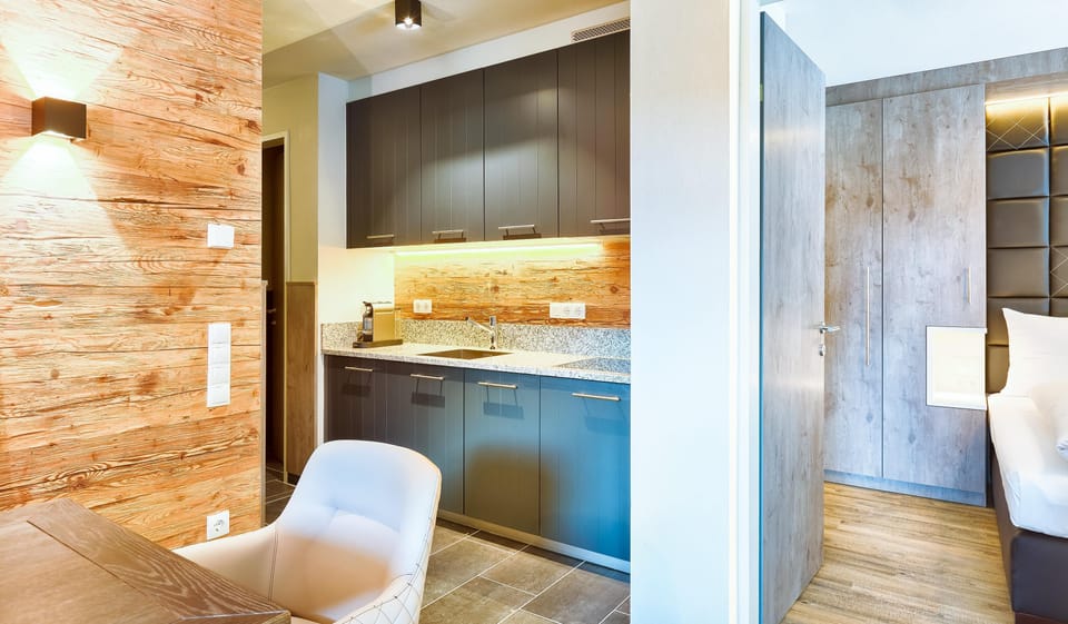Suite, 2 Bedrooms | Private kitchen | Fridge, dishwasher, coffee/tea maker, electric kettle