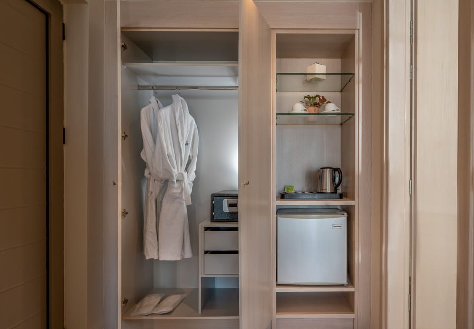 Serenity Double Room with Sea View | Desk, blackout drapes, soundproofing, iron/ironing board