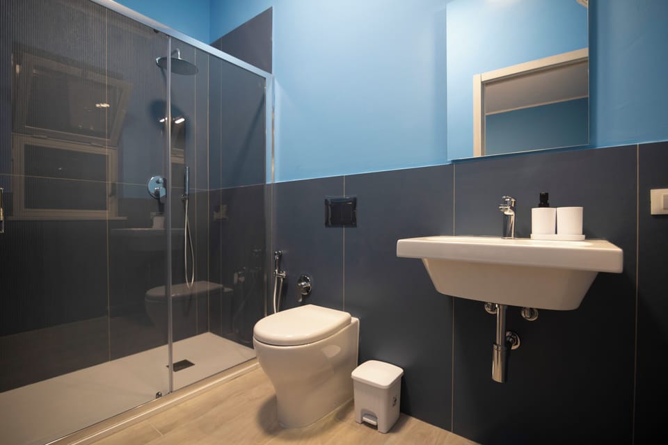 Double Room, Balcony, Mountain View | Bathroom | Shower, towels, soap, shampoo