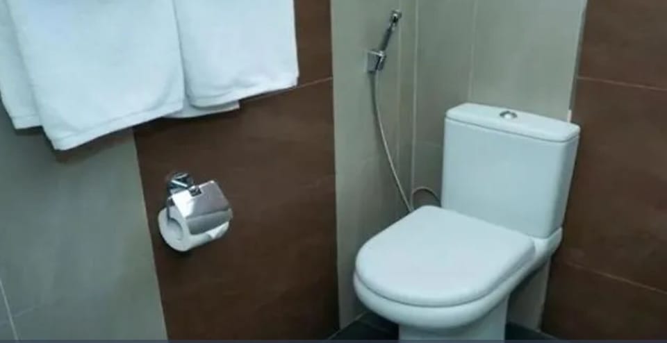Deluxe Double Room, Balcony, Mountain View | Bathroom | Free toiletries, bidet, towels, soap