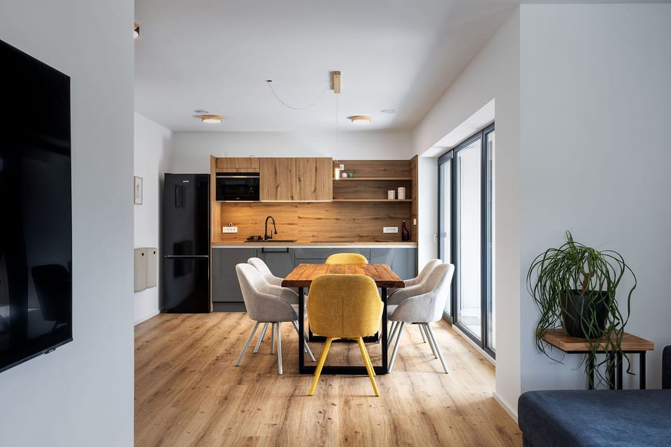 Deluxe Apartment | Living area | Toys, heated floors