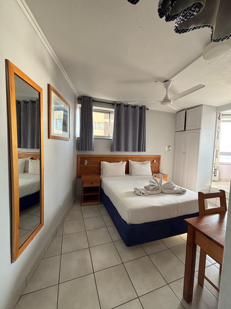 Standard Room, Partial Sea View | In-room safe, laptop workspace, blackout drapes, iron/ironing board