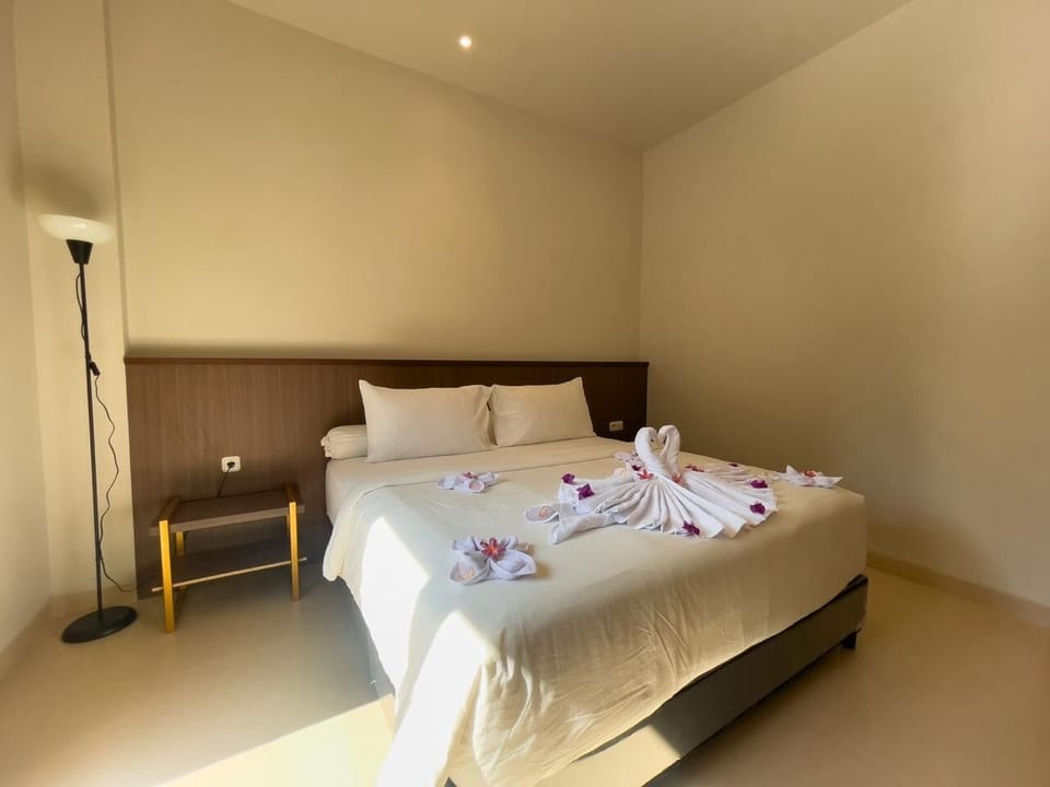 Deluxe Room, Pool View | In-room safe, desk, laptop workspace, WiFi (free)