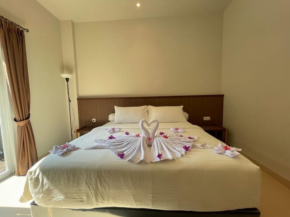 Deluxe Room, Pool View | In-room safe, desk, laptop workspace, WiFi (free)