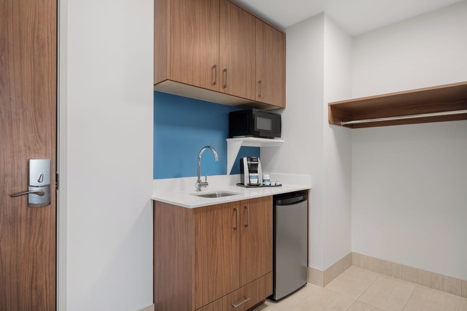 Suite, Multiple Beds (Wet Bar, Pet Friendly) | In-room safe, desk, laptop workspace, blackout drapes