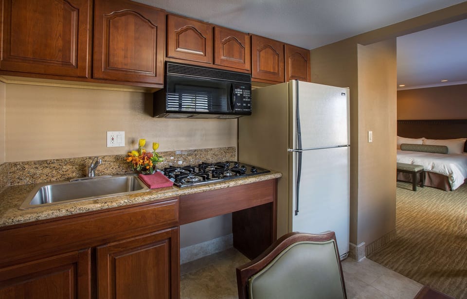 Premium Studio Suite, 1 King Bed (Coast Premium King Studio Suite) | Private kitchen | Coffee/tea maker