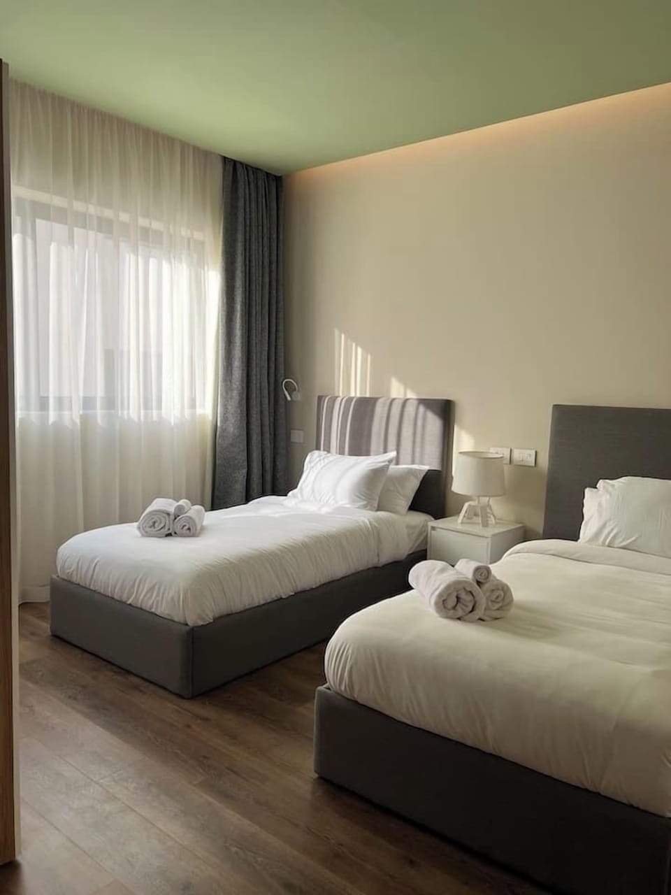 Apartment, Balcony, Garden View | In-room safe, blackout drapes, iron/ironing board, free WiFi