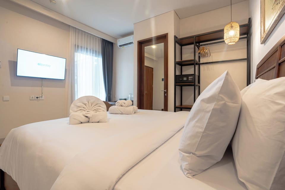 Deluxe Double Room, Pool View | In-room safe, desk, laptop workspace, free WiFi