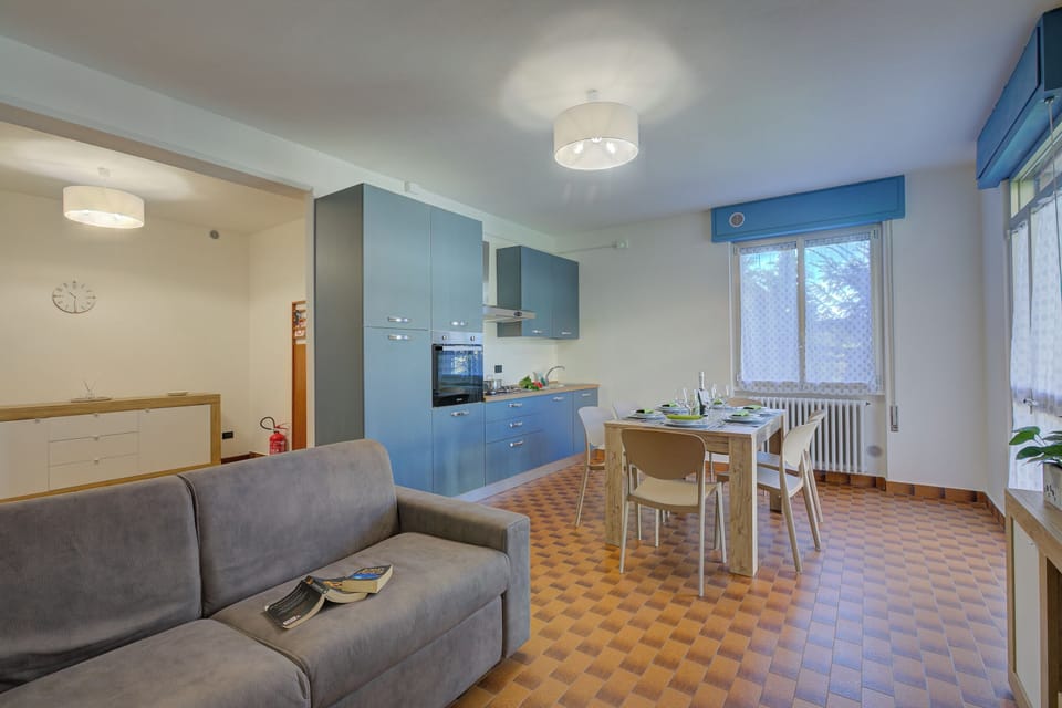 Family Apartment, Multiple Bedrooms (Diana & Mark family house) | Living area | 21-inch flat-screen TV with cable channels