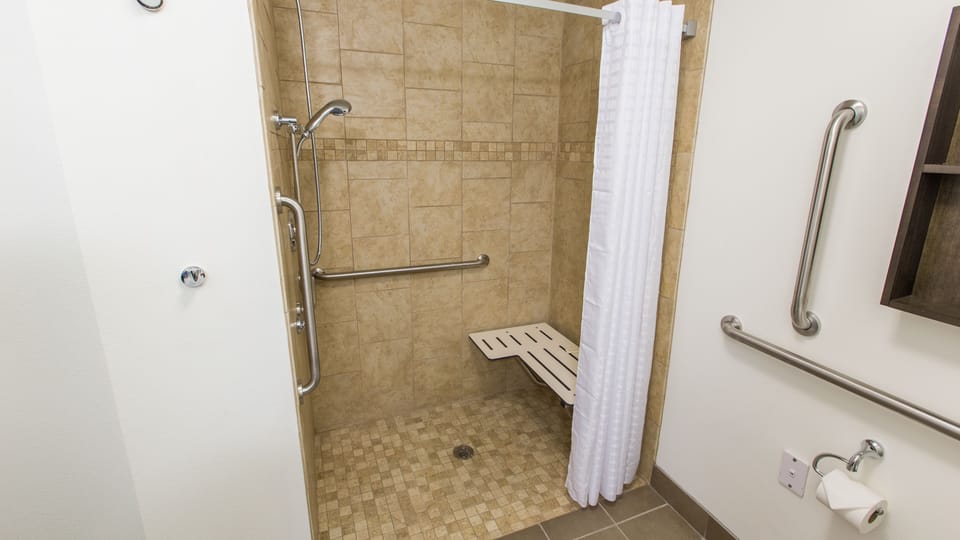 Studio Suite, 1 Queen Bed, Accessible (Mobil Roll In Shwr) | Bathroom | Shower, free toiletries, hair dryer, towels