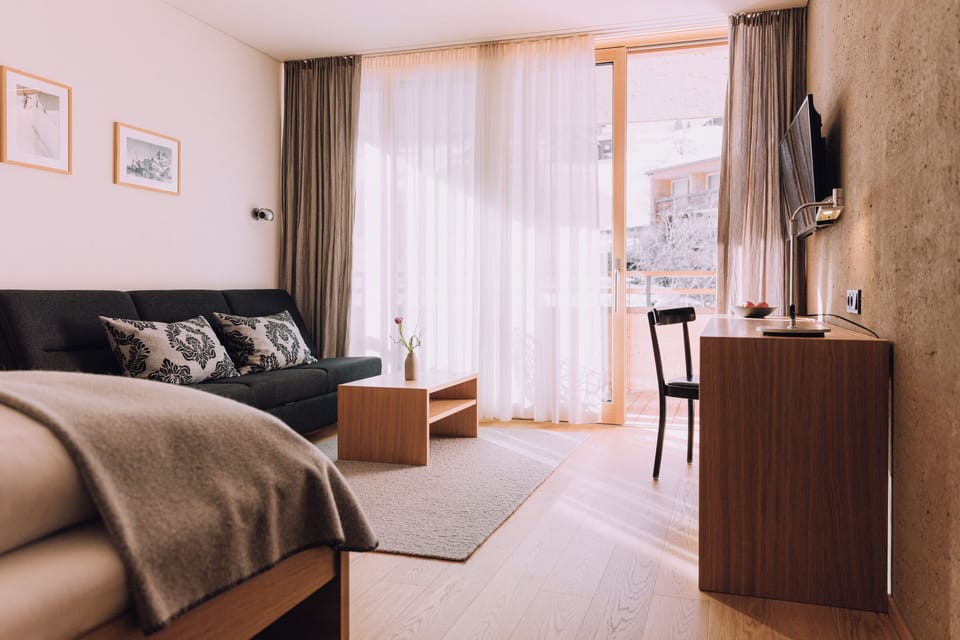 Comfort Room, Balcony, Mountain View | Living area | Flat-screen TV, foosball, table tennis, toys