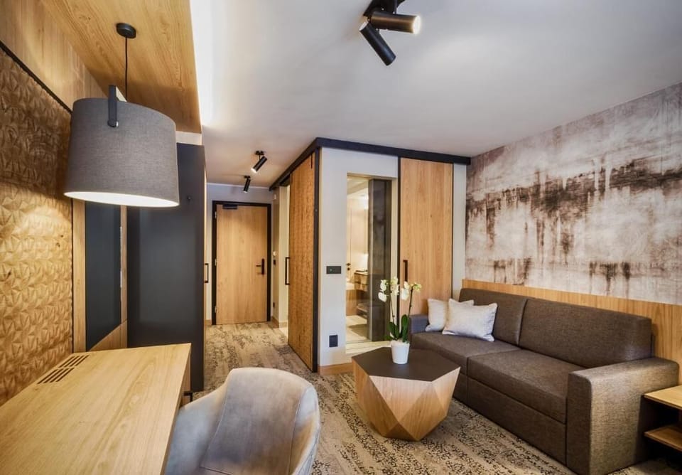 Junior Suite, Balcony, Mountain View | Living area | 32-inch flat-screen TV with satellite channels