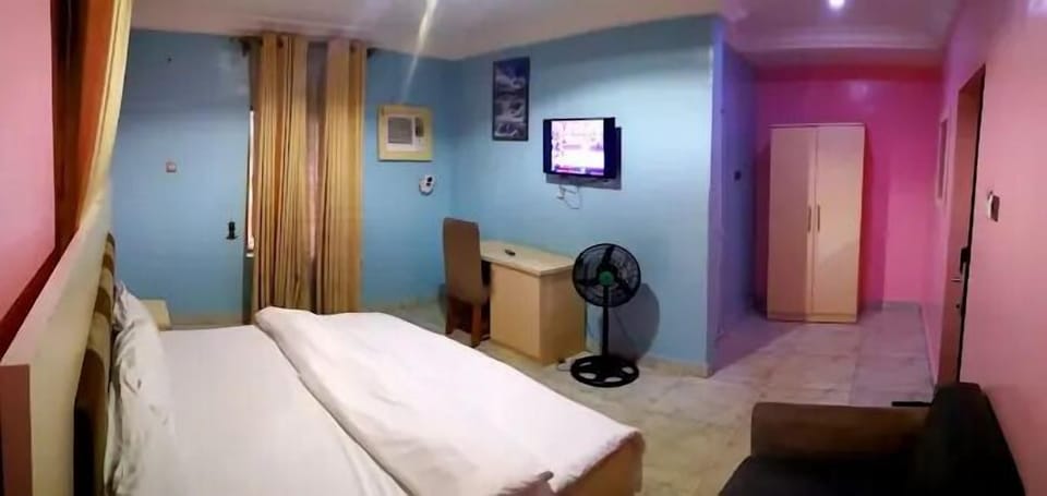 Deluxe Room, Balcony, City View | Desk, laptop workspace, blackout drapes, soundproofing