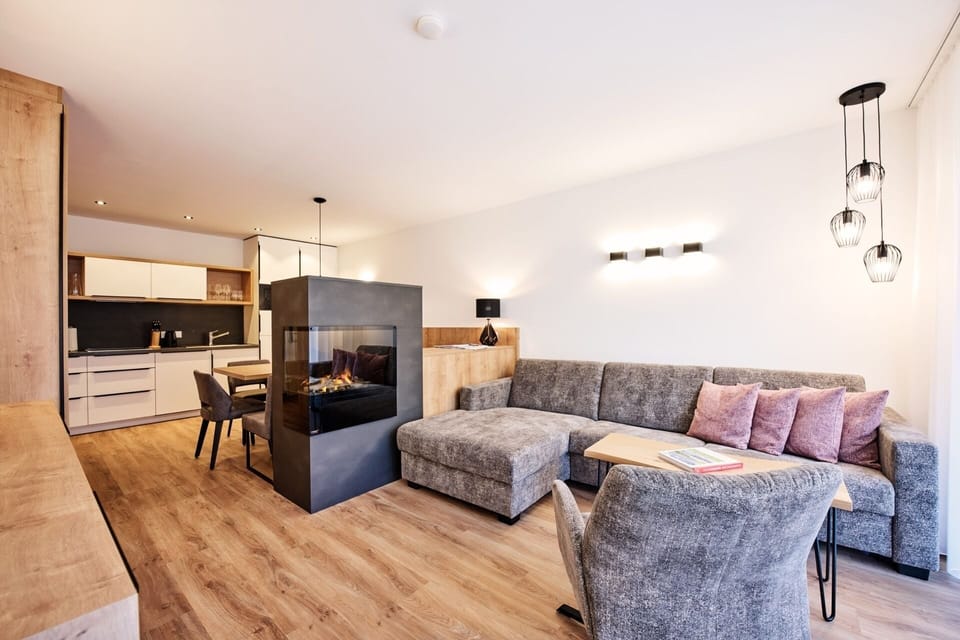 Standard Cabin | Living area | 90-inch flat-screen TV with satellite channels