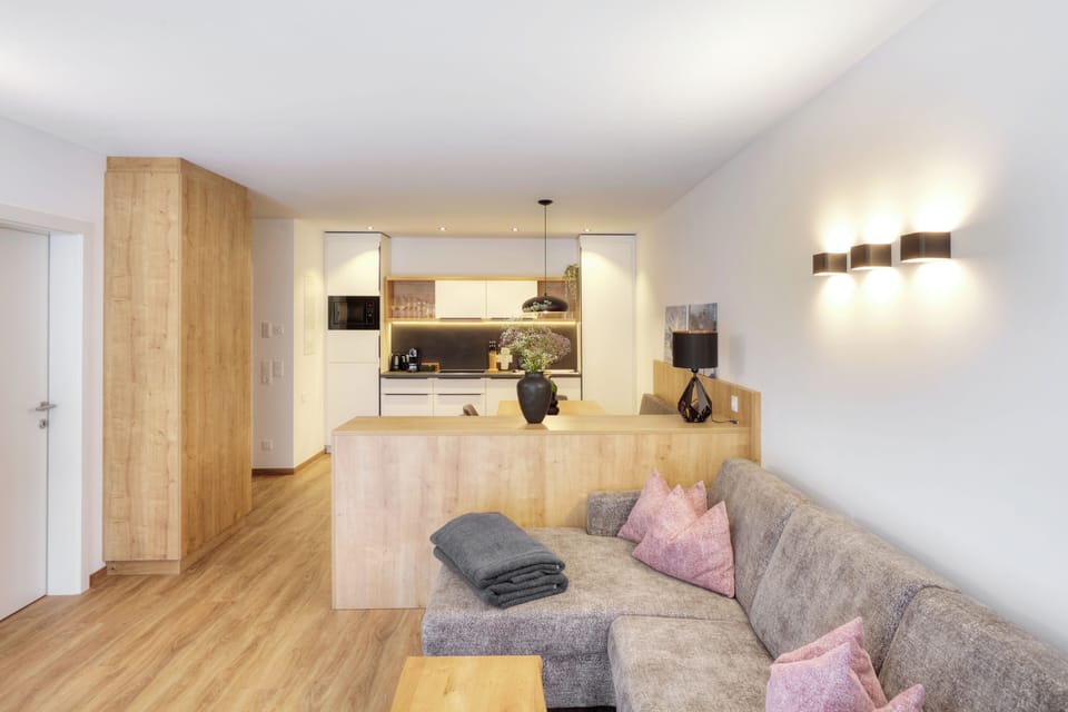 Alpenstolz 1.09 | Living area | 90-inch flat-screen TV with satellite channels