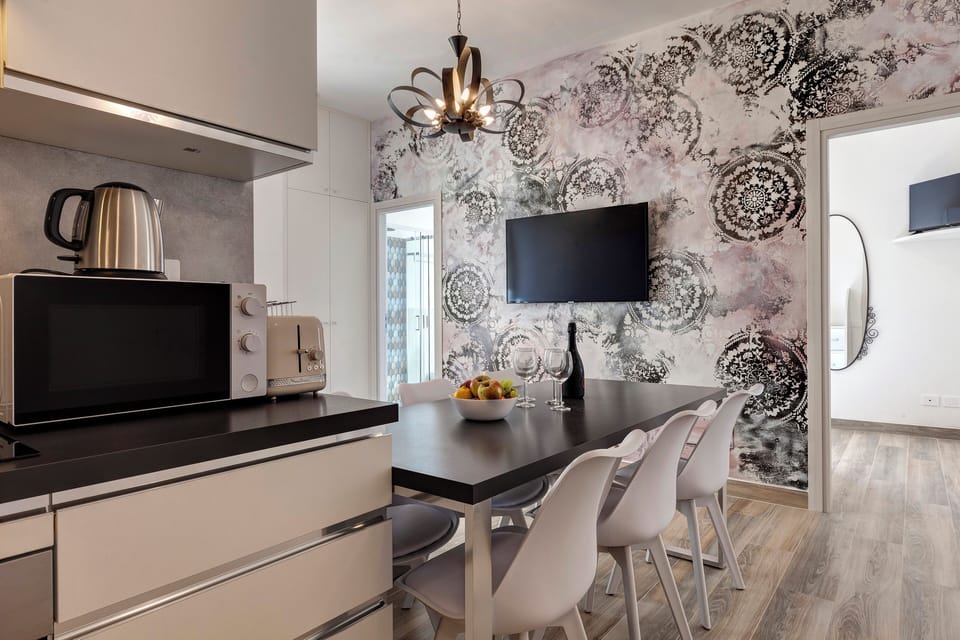 Apartment | Living area | 40-inch flat-screen TV with digital channels