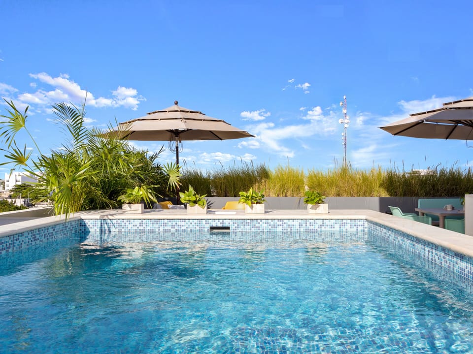2 outdoor pools, pool umbrellas, sun loungers