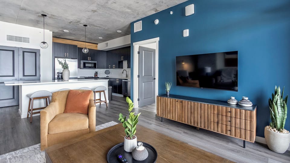 Apartment, 2 Bedrooms | Living area | 50-inch TV with digital channels