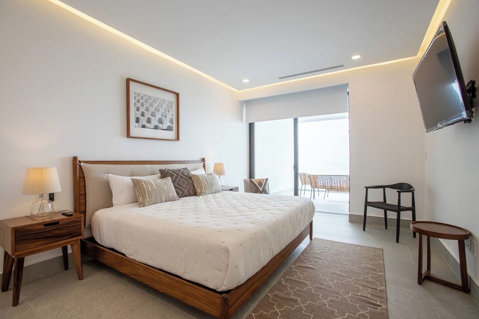 Deluxe Apartment, Beach View | Premium bedding, down comforters, blackout drapes, soundproofing