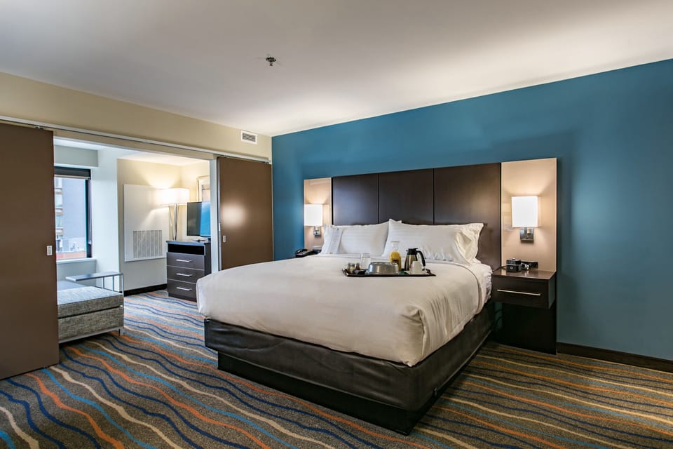 Hypo-allergenic bedding available, in-room safe, desk, laptop workspace