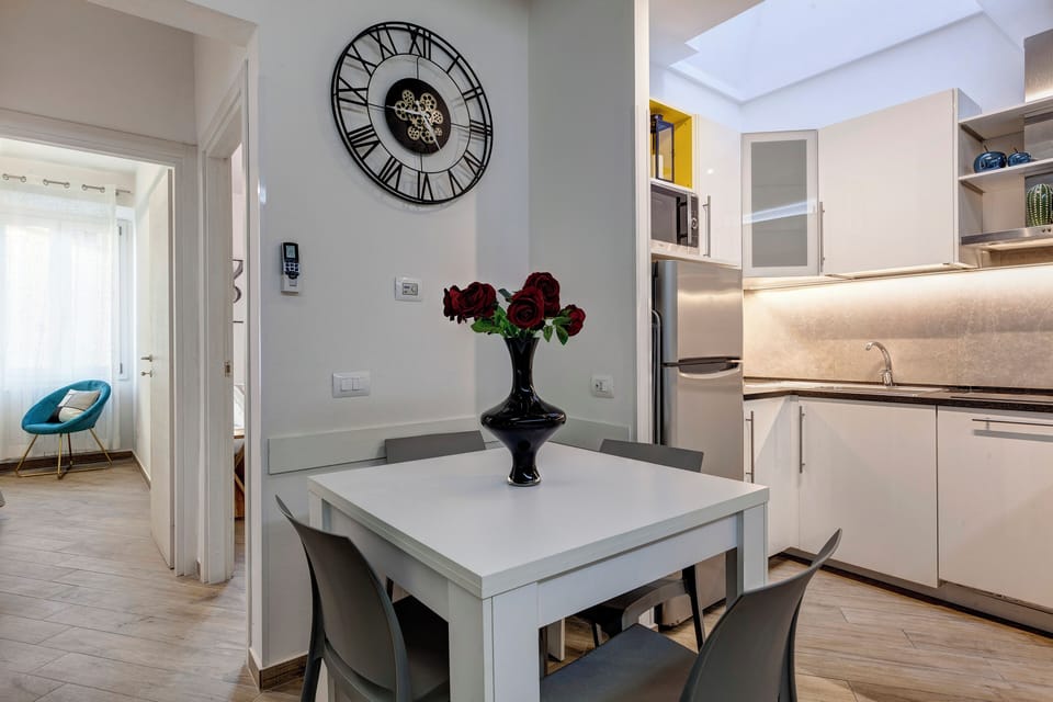 Apartment | Living area | 30-inch flat-screen TV with satellite channels
