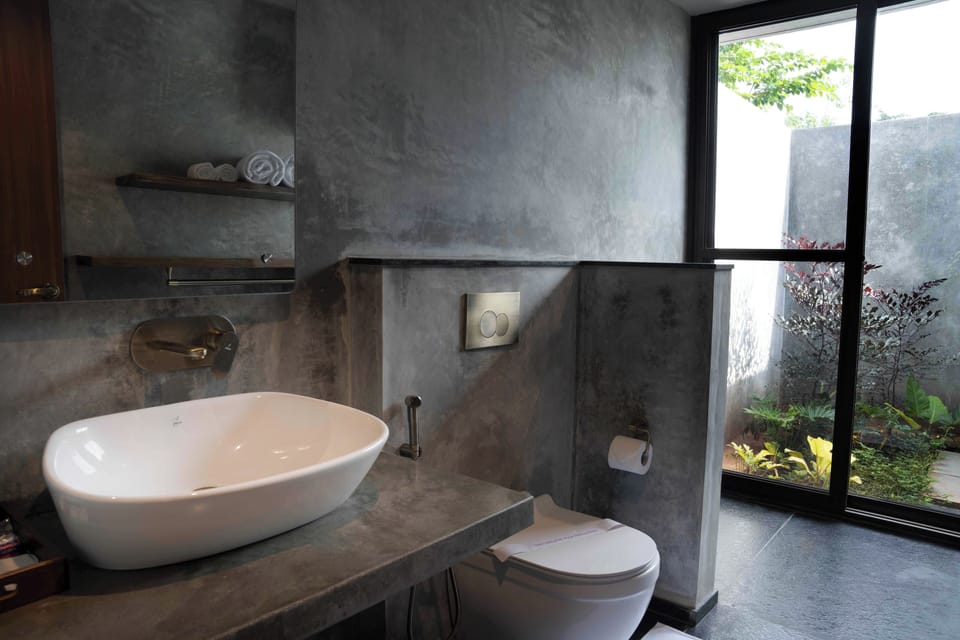 Shower, rainfall showerhead, towels, soap