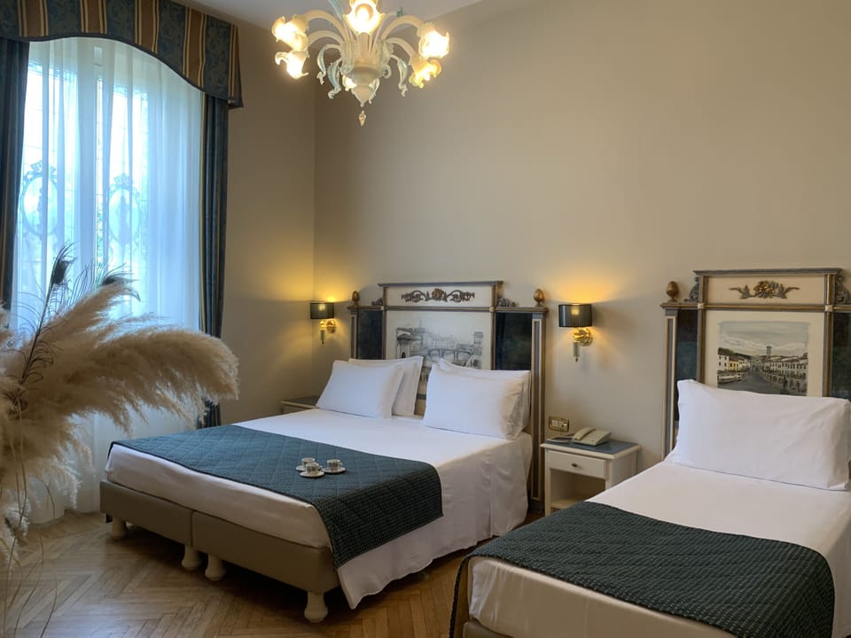 Classic Triple Room | Minibar, individually furnished, desk, blackout drapes