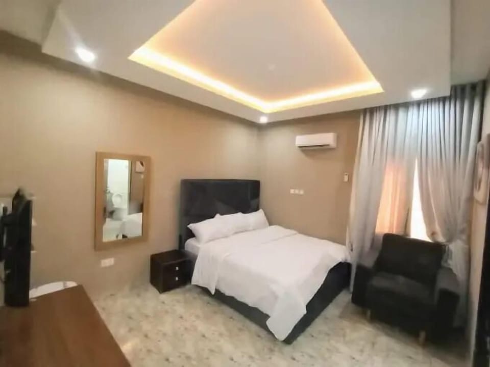Deluxe Room, Balcony, City View | Desk, laptop workspace, blackout drapes, soundproofing