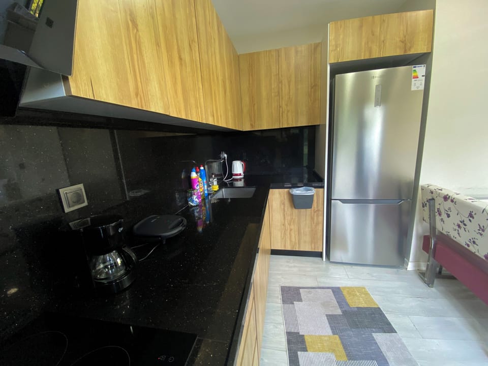 Comfort Villa, Balcony, City View | Private kitchenette | Coffee/tea maker, electric kettle