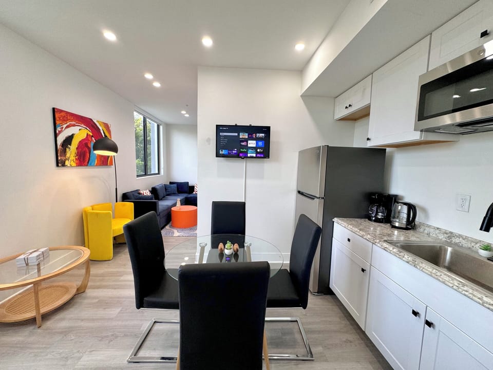 Comfort Studio, City View | Living area | TV