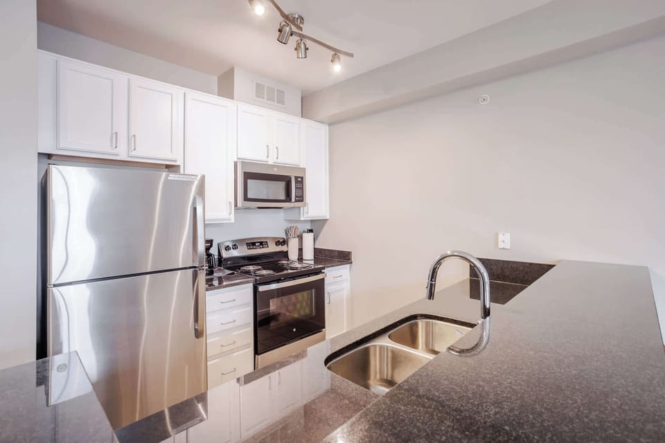 Deluxe Apartment (2 units) | Living area | 42-inch Smart TV with digital channels, Netflix, Hulu