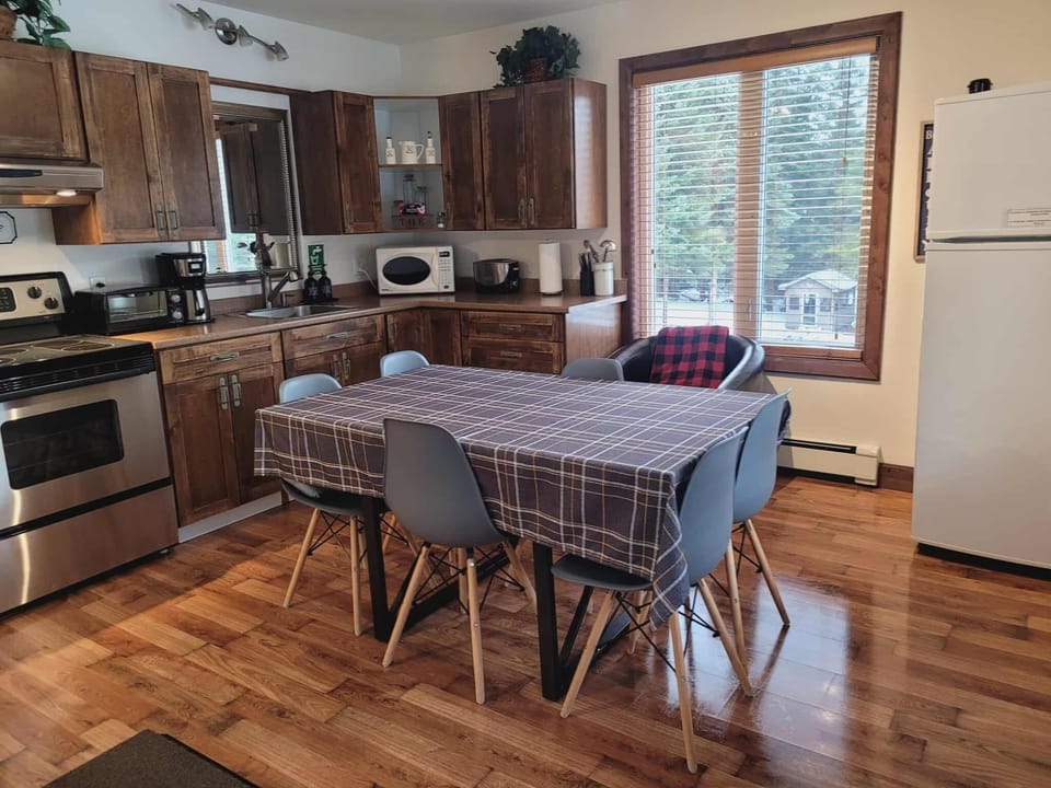 Microwave, toaster, cleaning supplies, freezer