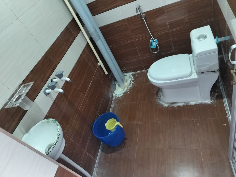 Shower, designer toiletries, towels, soap