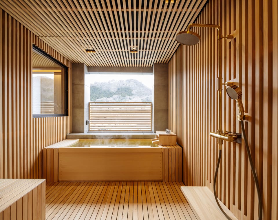 Room with open-air bath | Bathroom | Hair dryer, bidet, towels, toilet paper