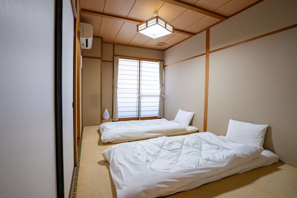 Japanese-Style Room for three people, 3 futon, Non smoking | In-room safe, free WiFi, bed sheets