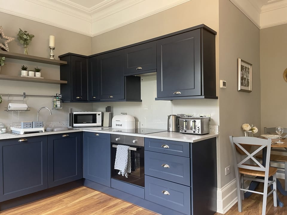 Fridge, microwave, toaster, cookware/dishes/utensils