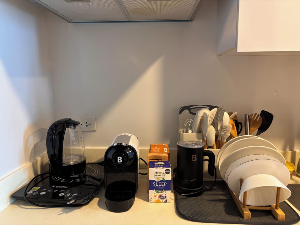 Deluxe Studio | Desk, laptop workspace, blackout drapes, iron/ironing board