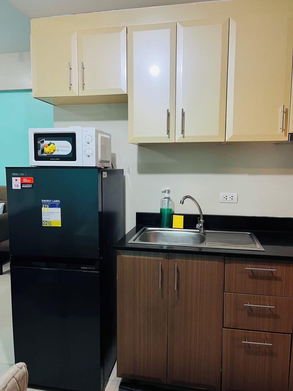 Suite, Balcony, City View | Private kitchen | Fridge, microwave, stovetop, dishwasher