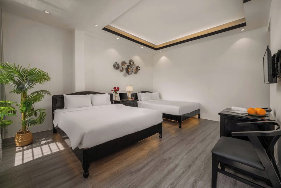 Family Quadruple Room | Minibar, laptop workspace, free WiFi, bed sheets